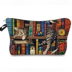 COPY - Cat napping on the bookshelf makeup/accessory bag.